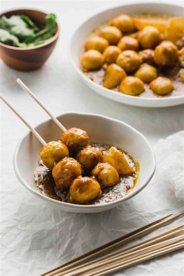  Jieyang-Style Curry Fish Balls:  Schmachtend saftige Fischbällchen treffen auf eine cremige, würzige Kokosnuss-Curry-Sauce!